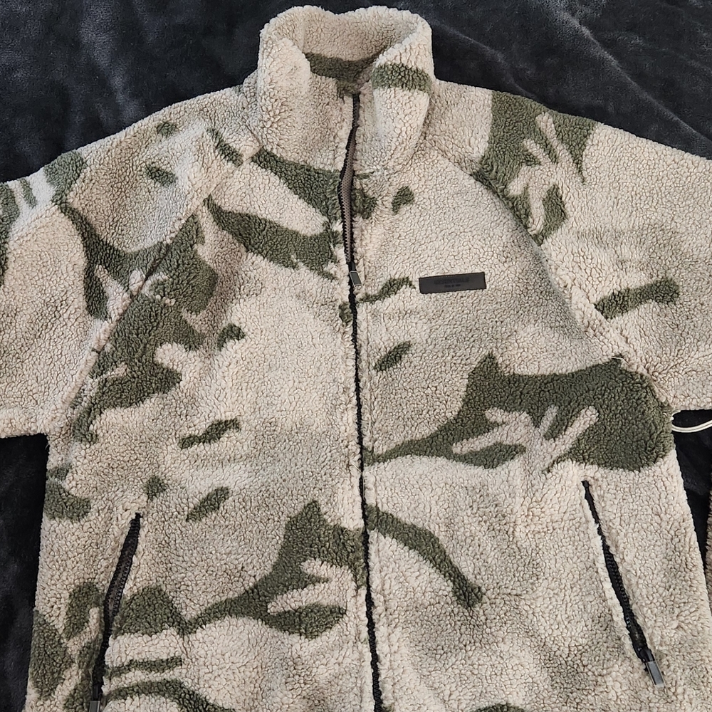 Fear Of God Essentials fleece jacket and pants set.